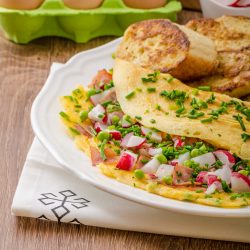 Omelette with spring vegetables and bacon